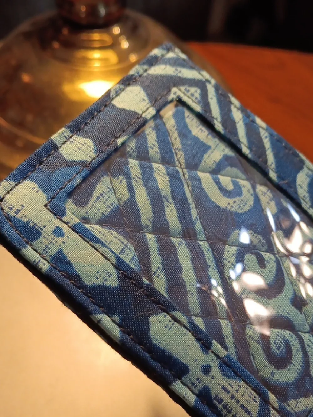Vera Bradley Zip ID Case in a blue batik-inspired geometric pattern. - Picture 9 of 11